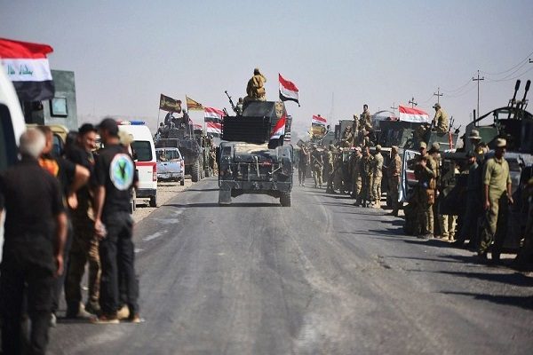 “رئيس وزراء العراق” يضم رسمياً مقاتلي الحشد الشعبي للقوات العراقية