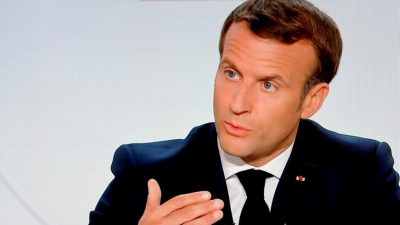 الرئيس الفرنسي يعلن حظر تجول ليلي في باريس ومدن أخرى